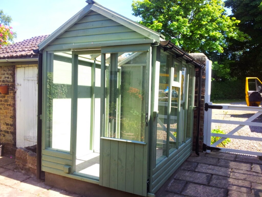Apex timber greenhouse