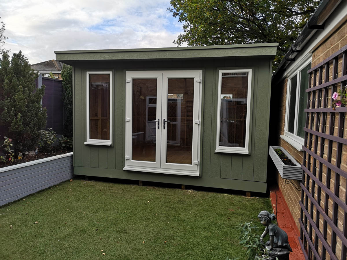 Garden room clad in Strongcore with UPVC doors and windows Garden room clad in Strongcore with UPVC doors and windows