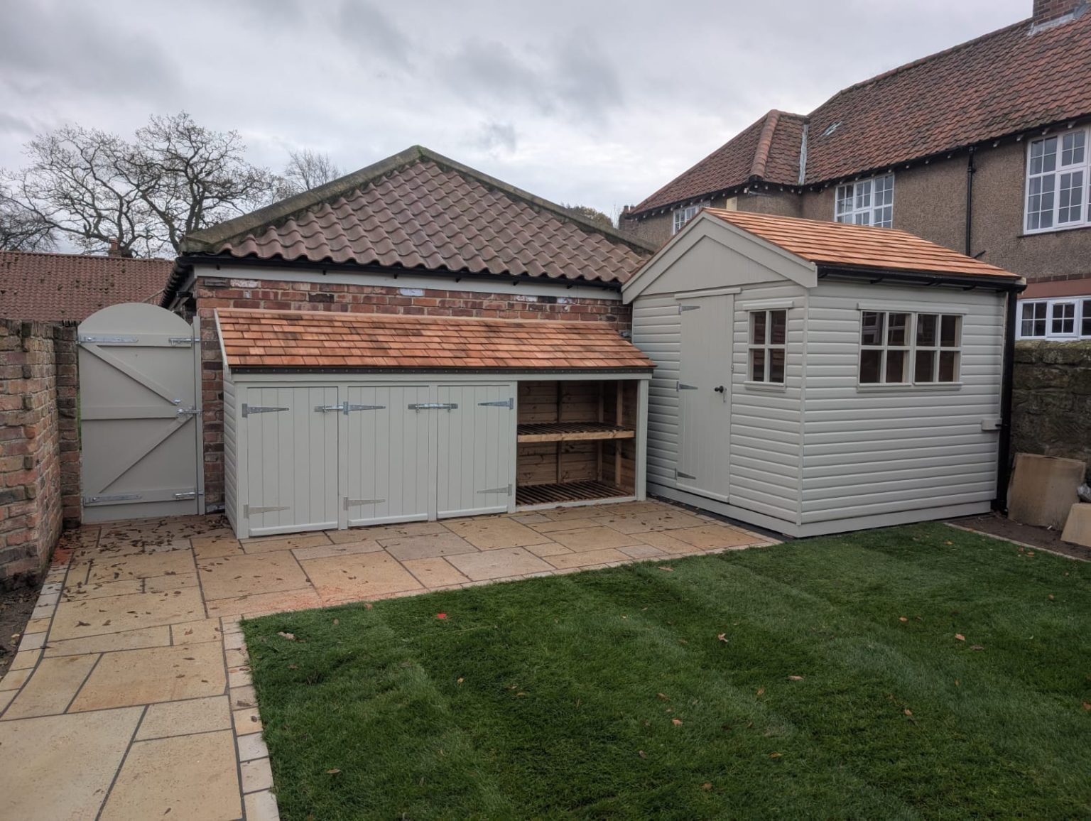 Bespoke posh shed with log store